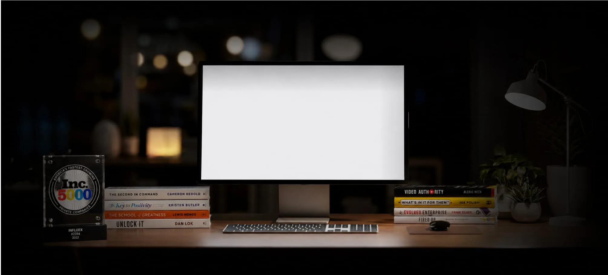 A desktop monitor on a wooden desk